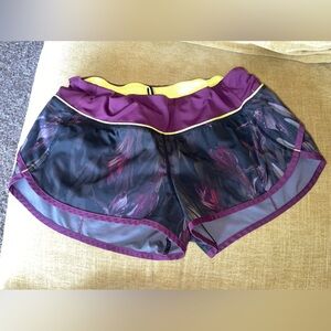 Discontinued purple and green speed up shorts